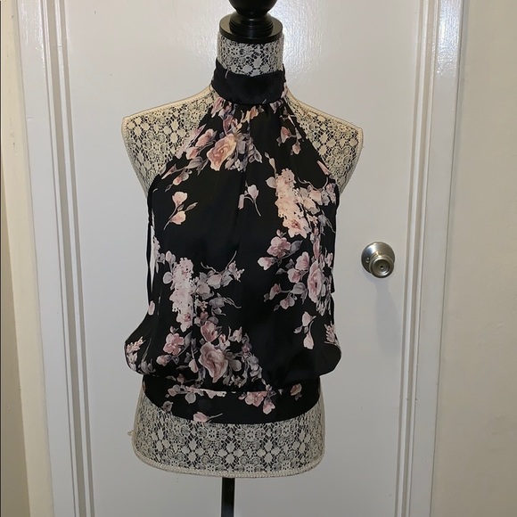 Tops - 100% polyester but feels silky Tops - 100% polyester but feels silky